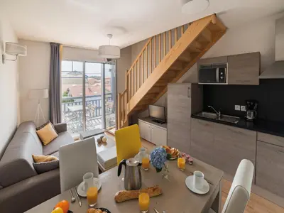 Coin salon dans l'établissement Apartment in Biscarrosse by the Beach