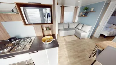 Cuisine ou kitchenette dans l'établissement Mobil home 4/6 personnes