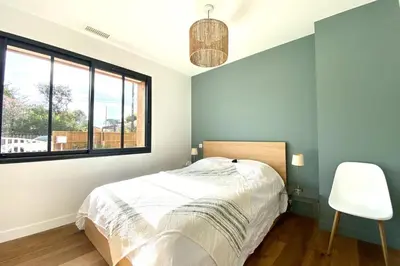 Un ou plusieurs lits dans un hébergement de l'établissement Villa neuve climatisée avec piscine chauffée