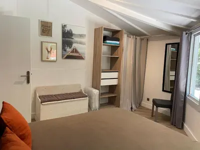 Un ou plusieurs lits dans un hébergement de l'établissement La petite maison au chêne