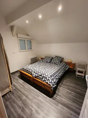 Un ou plusieurs lits dans un hébergement de l'établissement Chalet au cœur des Landes