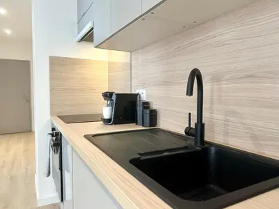 Cuisine ou kitchenette dans l'établissement L'AUTHENTIQUE - Moderne - Central