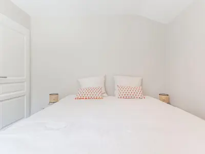 Un ou plusieurs lits dans un hébergement de l'établissement Villa Caloye by Interhome