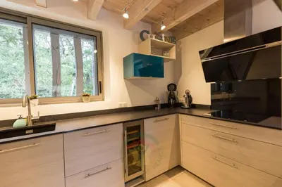 Cuisine ou kitchenette dans l'établissement Gite et Spa La Bougerie