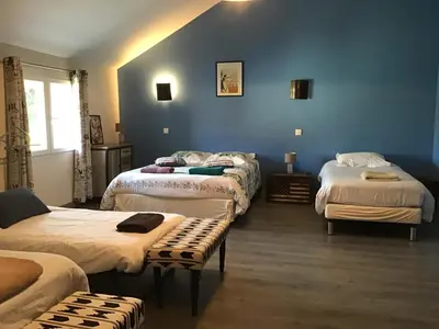Un ou plusieurs lits dans un hébergement de l'établissement Chambre d'hôtes Maison des 5 Fleurs