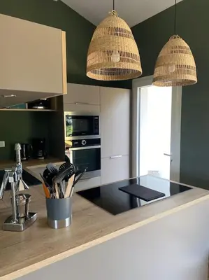 Cuisine ou kitchenette dans l'établissement Maison cocooning proche plages