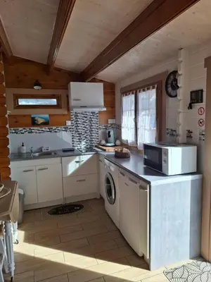 Cuisine ou kitchenette dans l'établissement Chalet