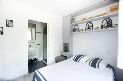 Un ou plusieurs lits dans un hébergement de l'établissement Sable et Reflets - T2 - Centre ville d'Hossegor