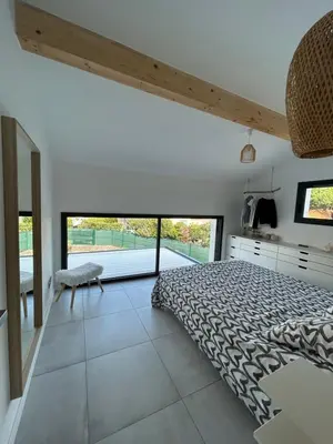 Un ou plusieurs lits dans un hébergement de l'établissement VILLA Grain De Sable PROCHE PLAGE, GOLF AVEC PISCINE