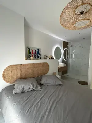 Un ou plusieurs lits dans un hébergement de l'établissement VILLA Grain De Sable PROCHE PLAGE, GOLF AVEC PISCINE