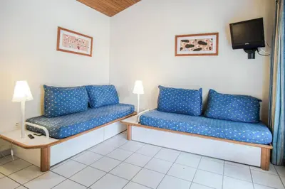 Coin salon dans l'établissement Village Moliets - maeva Home - 2 Pièces 7 Personnes Confort MAE-2247