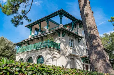 Jardin de l'établissement Le Petit Moulleau - Appt dans villa classée à 50m de la plage