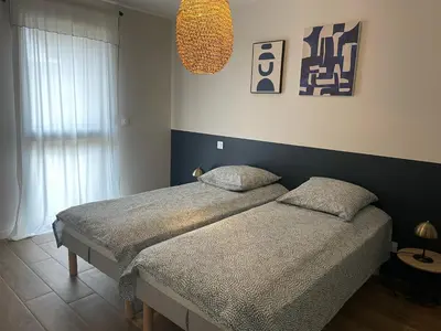 Un ou plusieurs lits dans un hébergement de l'établissement Vue Mer - Au Coeur de Contis Plage