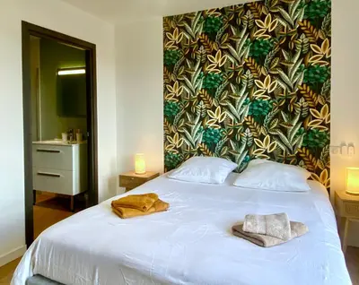 Un ou plusieurs lits dans un hébergement de l'établissement Vue Phare - Au Coeur de Contis Plage