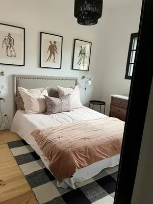Un ou plusieurs lits dans un hébergement de l'établissement Maison 8 personnes avec jardin piscine st Julien en Born Contis