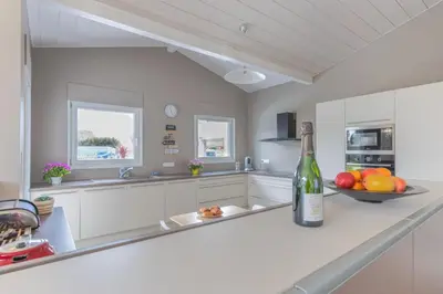 Cuisine ou kitchenette dans l'établissement Villa Uhaina Sérénité Océane