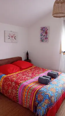 Un ou plusieurs lits dans un hébergement de l'établissement Maison au calme nature et plage La Cabane du Marais