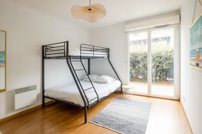 Un ou plusieurs lits dans un hébergement de l'établissement Appartement Exupéry - Welkeys