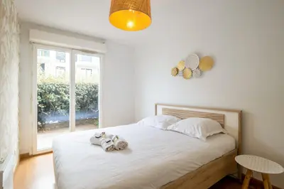 Un ou plusieurs lits dans un hébergement de l'établissement Appartement Exupéry - Welkeys