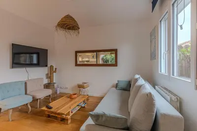 Télévision ou salle de divertissement dans l'établissement La Terrasse
