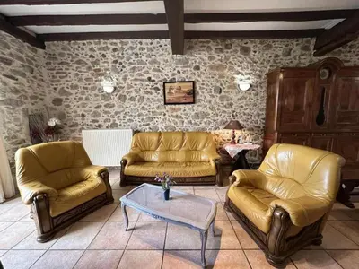 Coin salon dans l'établissement Gite de spalette