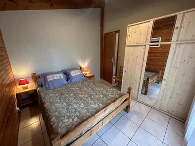 Un ou plusieurs lits dans un hébergement de l'établissement Chalet des dunes