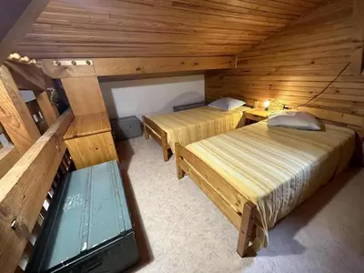 Un ou plusieurs lits dans un hébergement de l'établissement Chalet des dunes