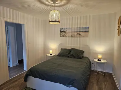 Un ou plusieurs lits dans un hébergement de l'établissement Maison perouge