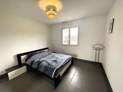 Un ou plusieurs lits dans un hébergement de l'établissement La villa lou miqueou