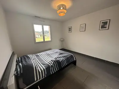 Un ou plusieurs lits dans un hébergement de l'établissement La villa lou miqueou