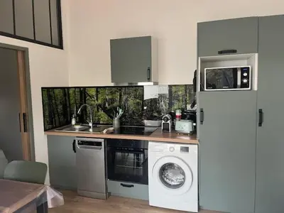 Cuisine ou kitchenette dans l'établissement Location havre de paix