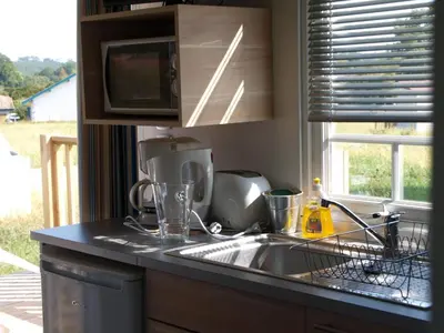 Cuisine ou kitchenette dans l'établissement La palombe