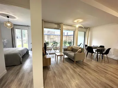 Coin salon dans l'établissement L'appartement de l'ermitage