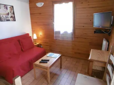 Télévision ou salle de divertissement dans l'établissement La callune