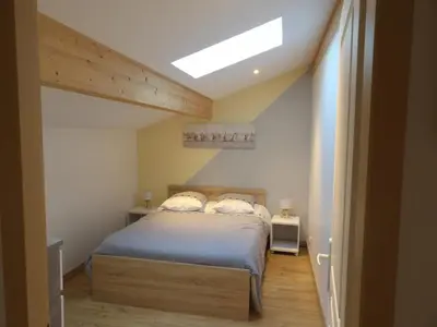 Un ou plusieurs lits dans un hébergement de l'établissement La villa du point du jour