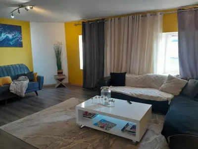 Coin salon dans l'établissement Vacances entre plage et montagnes