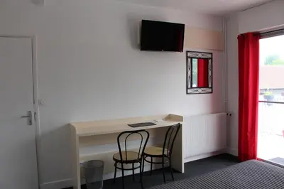 Télévision ou salle de divertissement dans l'établissement Rest 'In Born