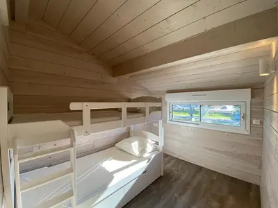Un ou plusieurs lits dans un hébergement de l'établissement Villa Patio Rénovée avec Terrasse Couverte, Proche du Port et Centre d'Hossegor - FR-1-413-228