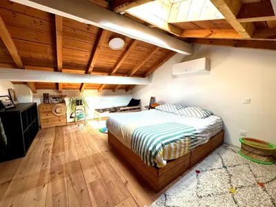 Un ou plusieurs lits dans un hébergement de l'établissement Maison Typique Landaise