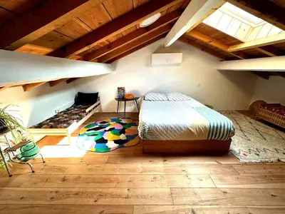 Un ou plusieurs lits dans un hébergement de l'établissement Maison Typique Landaise