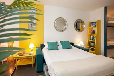 Un ou plusieurs lits dans un hébergement de l'établissement La Dune d'Or - Vue Mer, Studio face à la Plage avec Terrasse