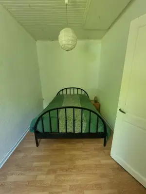 Un ou plusieurs lits dans un hébergement de l'établissement Maison vacances les fougères