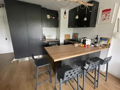 Cuisine ou kitchenette dans l'établissement Tao Le Sporting
