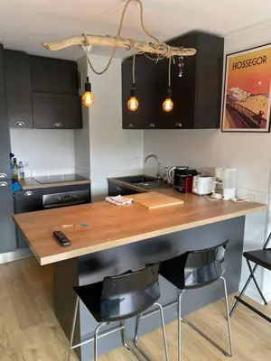 Cuisine ou kitchenette dans l'établissement Tao Le Sporting