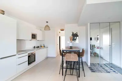 Cuisine ou kitchenette dans l'établissement Le Bonamour - Élégance et sérénité entre plage et port