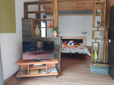 Télévision ou salle de divertissement dans l'établissement Casa Chélo