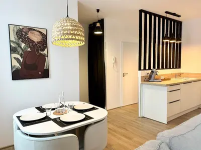 Cuisine ou kitchenette dans l'établissement Le Despiau - Parking - Clim - Fibre - Proche Base