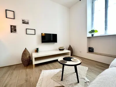 Télévision ou salle de divertissement dans l'établissement Le Despiau - Parking - Clim - Fibre - Proche Base