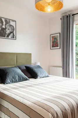 Un ou plusieurs lits dans un hébergement de l'établissement Villa Terrama Capbreton