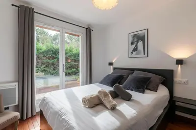 Un ou plusieurs lits dans un hébergement de l'établissement Villa Terrama Capbreton